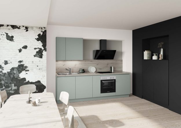 Klassische Küchenzeile von Häcker mit pastellgrünen Fronten erhältlich bei Das Küchenstudio